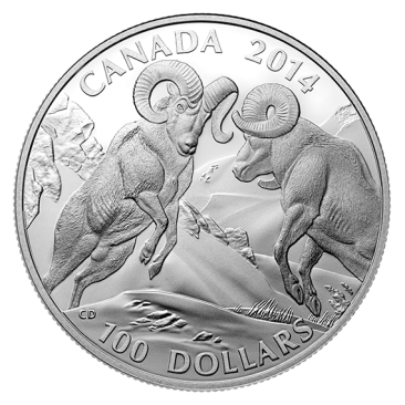 a silver coin with a picture of rams