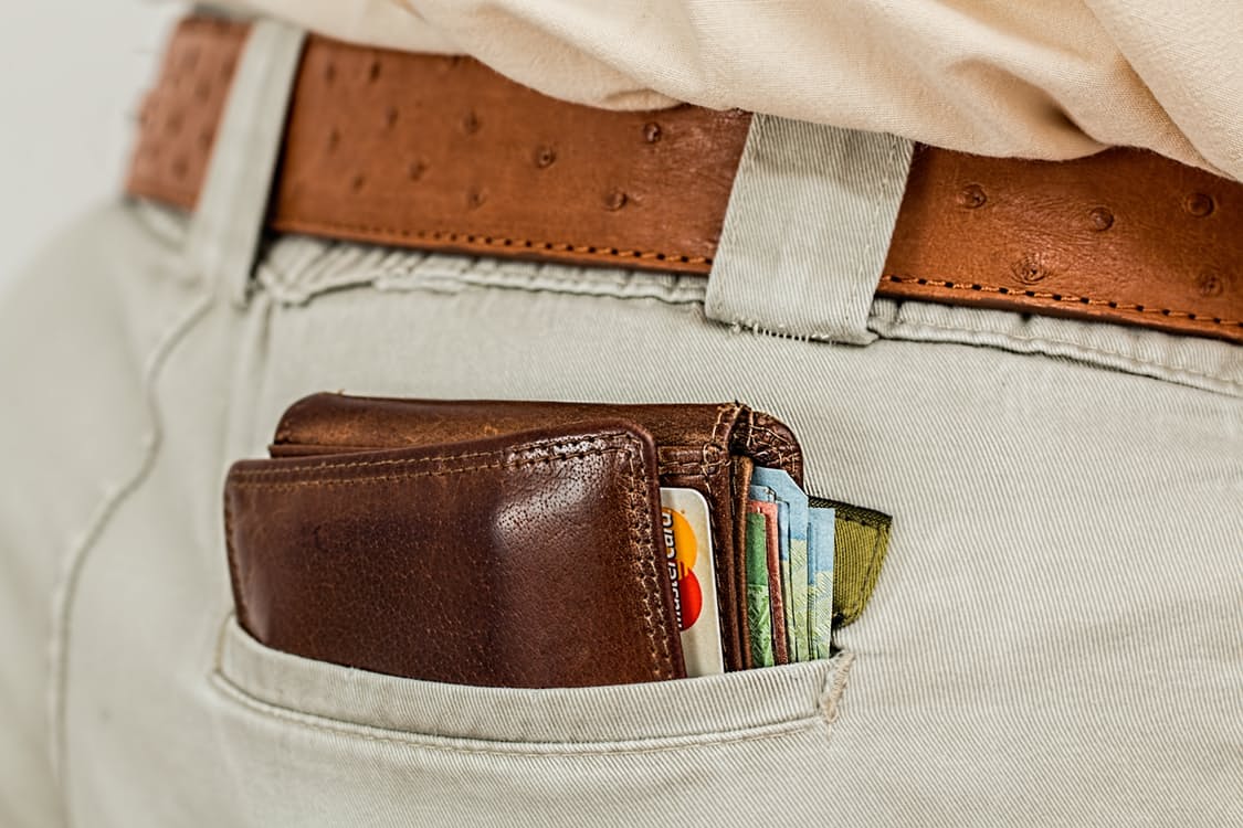 a wallet and money in a pocket