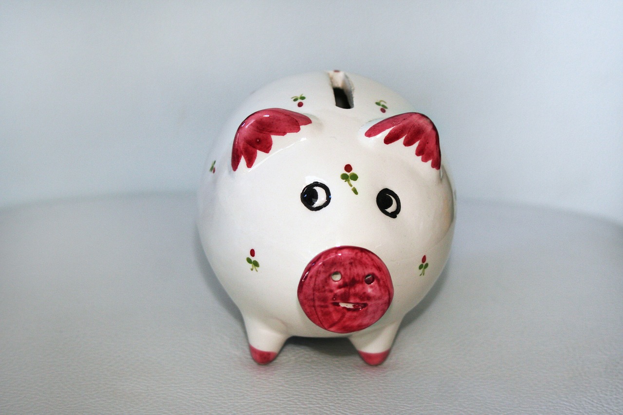 a piggy bank with a face painted on it
