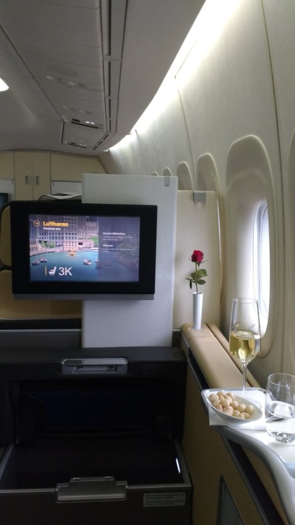 a tv on a stand in a plane